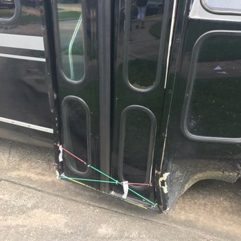 Clutch City Tours - Doors that did not shut and were closed shut with 2 bungee cords! Large holes on body of vehicle. - Bus Tours Near Me Clutch City Tours - Doors that did not shut and were closed shut with 2 bungee cords! Large holes on body of vehicle. - Bus Tours Near Me