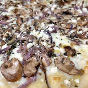 The Pizza Taproom - Tuscan Mushroom (Extra Large). I love the shiitake mushrooms' earthy flavors and the truffle's distinct pungent umami. - Pizza Near Me - La Jolla, California The Pizza Taproom - Tuscan Mushroom (Extra Large). I love the shiitake mushrooms' earthy flavors and the truffle's distinct pungent umami. - Pizza Near Me - La Jolla, California