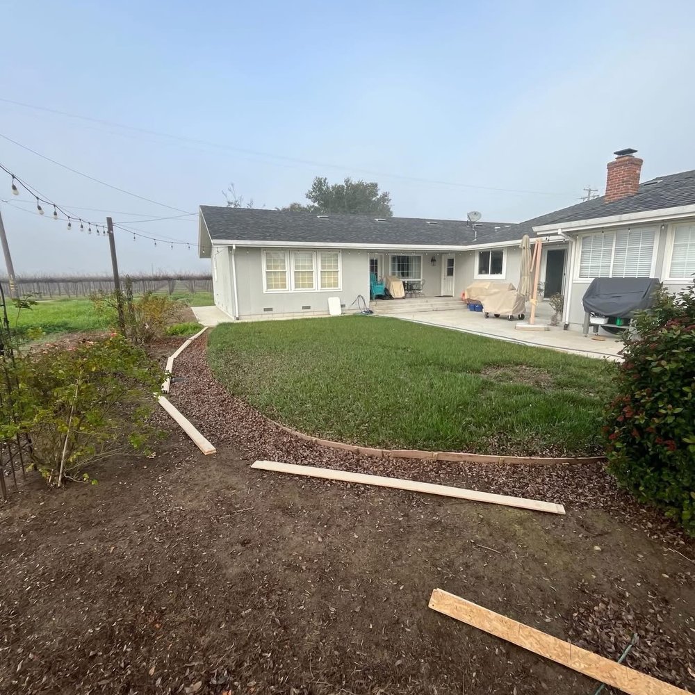 American Remodels - Getting ready to form mow strip - Painters Near Me