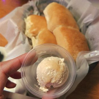 Texas Roadhouse - Complimentary bread rolls with signature honey cinnamon butter - Steakhouses Near Me - Oceanside, California Texas Roadhouse - Complimentary bread rolls with signature honey cinnamon butter - Steakhouses Near Me - Oceanside, California