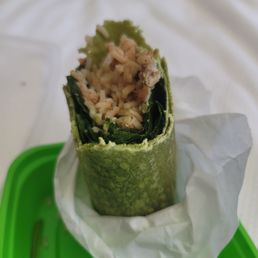 Chicken, brown rice and spinach wrap. Chicken, brown rice and spinach wrap.