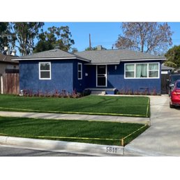 Front of the house after the grass was installed Front of the house after the grass was installed