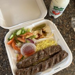 Lamb kebab plate with duke mint soda. Lamb kebab plate with duke mint soda.
