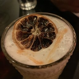 a close up of a drink in a glass