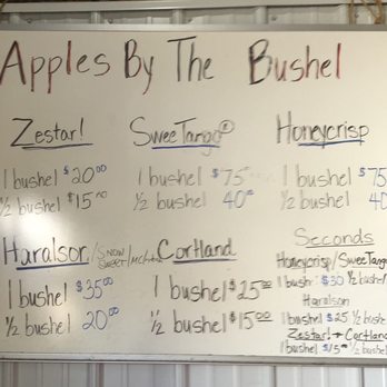 Brand Farms - a whiteboard with a list of apples by the bushel - Fruits & Veggies Near Me - Farmington, Minnesota