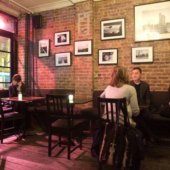Minibar - a group of people sitting at a table - Wine Bars Near Me - Brooklyn, New York