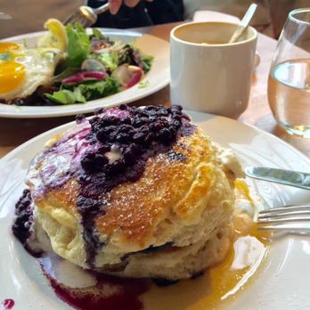 Mildred's Temple Kitchen - Looks like this blueberry pancake had waited its time before being served to our table. Or why else the cream on top is flat? - Breakfast & Brunch Near Me - Toronto, Ontario Mildred's Temple Kitchen - Looks like this blueberry pancake had waited its time before being served to our table. Or why else the cream on top is flat? - Breakfast & Brunch Near Me - Toronto, Ontario