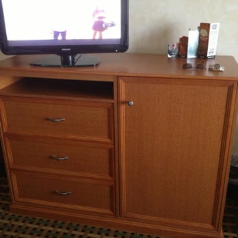 Holiday Inn Express Rawlins - Large cabinet to right has mini microwave and mini fridge inside. - Hotels Near Me - Rawlins, Wyoming Holiday Inn Express Rawlins - Large cabinet to right has mini microwave and mini fridge inside. - Hotels Near Me - Rawlins, Wyoming