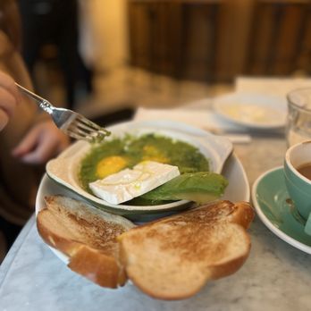 Jack's Wife Freda - Shakshuka with cheese and challah - Breakfast & Brunch Near Me - New York, New York Jack's Wife Freda - Shakshuka with cheese and challah - Breakfast & Brunch Near Me - New York, New York