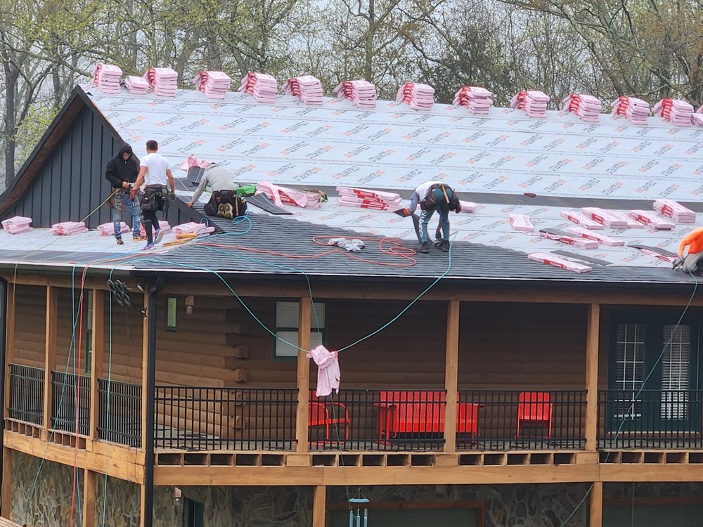 Slide of E. Thompson Roofing