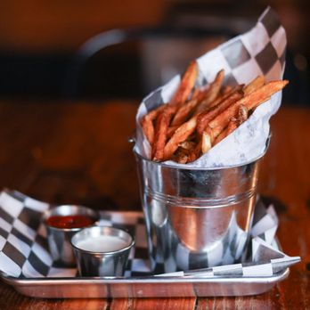 The Jockey Bar - Fresh hand-cut fries, golden and lightly salted, served with your choice of two dipping sauces - Irish Pub Near Me - Lexington, Kentucky The Jockey Bar - Fresh hand-cut fries, golden and lightly salted, served with your choice of two dipping sauces - Irish Pub Near Me - Lexington, Kentucky