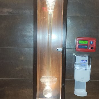 Yard House - An encased 32oz Half Yard Beer Glass at the entrance - New American Near Me - Dallas, Texas Yard House - An encased 32oz Half Yard Beer Glass at the entrance - New American Near Me - Dallas, Texas