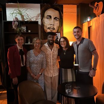 Off The Clock - Pictured with the owner (middle) and his wife (left). - Cocktail Bars Near Me - Lake Worth Beach, Florida