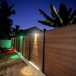 The Eco Fence - Looks beautiful at night! Solar lights turn on automatically.
