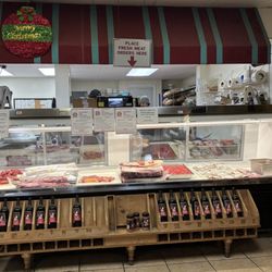 Mr P's Butcher Shop & Deli - Premium meat case. Great local deli. High energy lunch crowd.