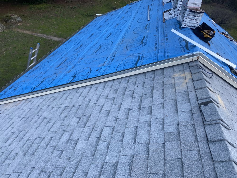 Slide of F M Quality Roofing
