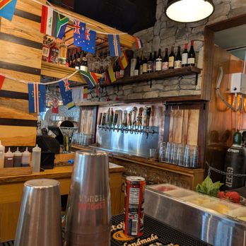 Stone Bar & Kitchen - Bar seats with wood fire oven in back - Sports Bars Near Me - Columbus, Ohio Stone Bar & Kitchen - Bar seats with wood fire oven in back - Sports Bars Near Me - Columbus, Ohio