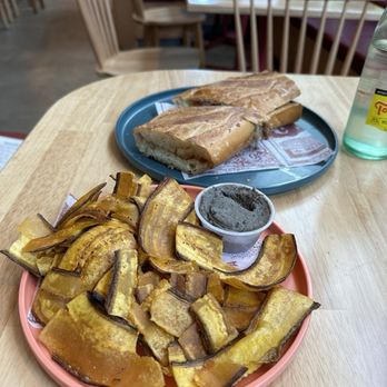 Colada Shop - Cuban sandwich and plantain chips with black bean dip - Coffee & Tea Near Me - Washington, DC, District of Columbia