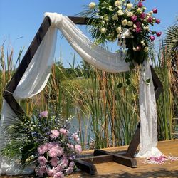 SWFL Wedding & Event Rentals - An arch Melissa helped provide items for for the wedding!