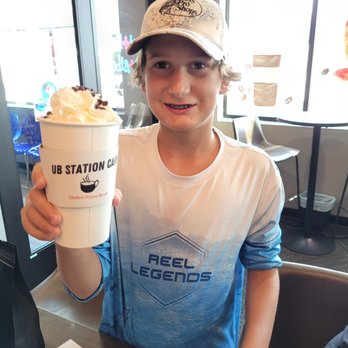 UB Station Cafe - a young boy holding a cup of ice cream - Coffee & Tea Near Me - Linden, Michigan UB Station Cafe - a young boy holding a cup of ice cream - Coffee & Tea Near Me - Linden, Michigan