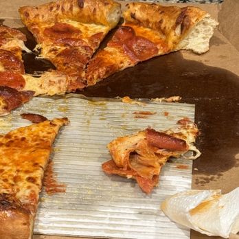 Marco's Pizza - a half eaten pizza - Pizza Near Me - Sanford, Florida Marco's Pizza - a half eaten pizza - Pizza Near Me - Sanford, Florida