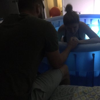 Sacred Journey Midwifery - Laboring along side my husband while in the tub provided by Lisa Marie. - Midwives Near Me - Riverside , California Sacred Journey Midwifery - Laboring along side my husband while in the tub provided by Lisa Marie. - Midwives Near Me - Riverside , California