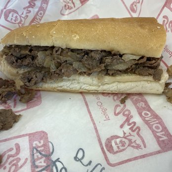 Big John Steak & Onion - a half eaten sandwich - Cheesesteaks Near Me - Burton, Michigan Big John Steak & Onion - a half eaten sandwich - Cheesesteaks Near Me - Burton, Michigan