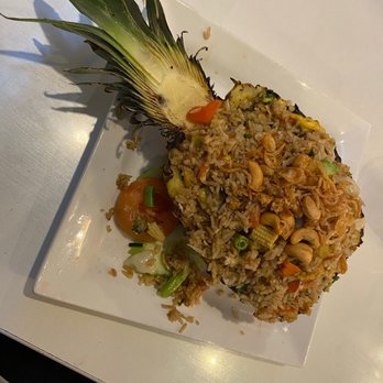 Charm Thai Bistro - Pineapple Fried Rice - Thai Near Me - Spring, Texas Charm Thai Bistro - Pineapple Fried Rice - Thai Near Me - Spring, Texas