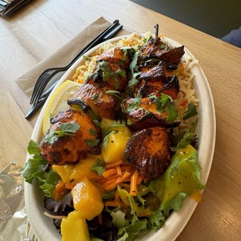 Tikka Shack Indian Grub - Chicken tikka bowl with mango salad and dressing and birriana rice. - Indian Near Me - Gilbert, Arizona Tikka Shack Indian Grub - Chicken tikka bowl with mango salad and dressing and birriana rice. - Indian Near Me - Gilbert, Arizona