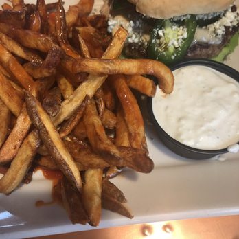 Agave Kitchen - Jalapeno Blue Burger with NOLA fries and homemade blue cheese - New American Near Me - Hudson, Wisconsin