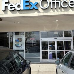 FedEx Office Print & Ship Center - Outside and parking lot. The sliding doors are a plus when you have full hands!