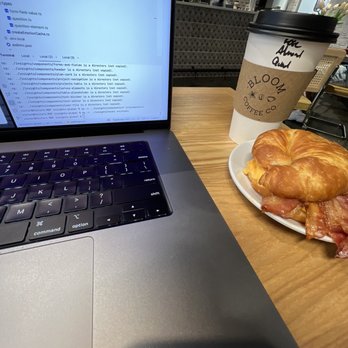 Bloom Coffee - Bacon egg and cheese on a croissant and salted caramel latte with almond milk - Coffee & Tea Near Me - Atlanta, Georgia Bloom Coffee - Bacon egg and cheese on a croissant and salted caramel latte with almond milk - Coffee & Tea Near Me - Atlanta, Georgia
