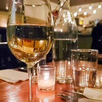 The Fish Friar - Glass of reisling. Intimate and appealing atmosphere. - Fish & Chips Near Me - Syracuse, New York The Fish Friar - Glass of reisling. Intimate and appealing atmosphere. - Fish & Chips Near Me - Syracuse, New York