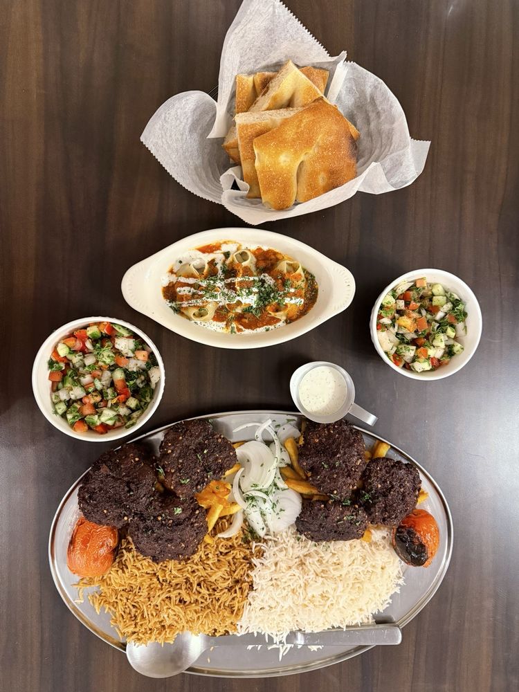 Rumi Kabob House Logo