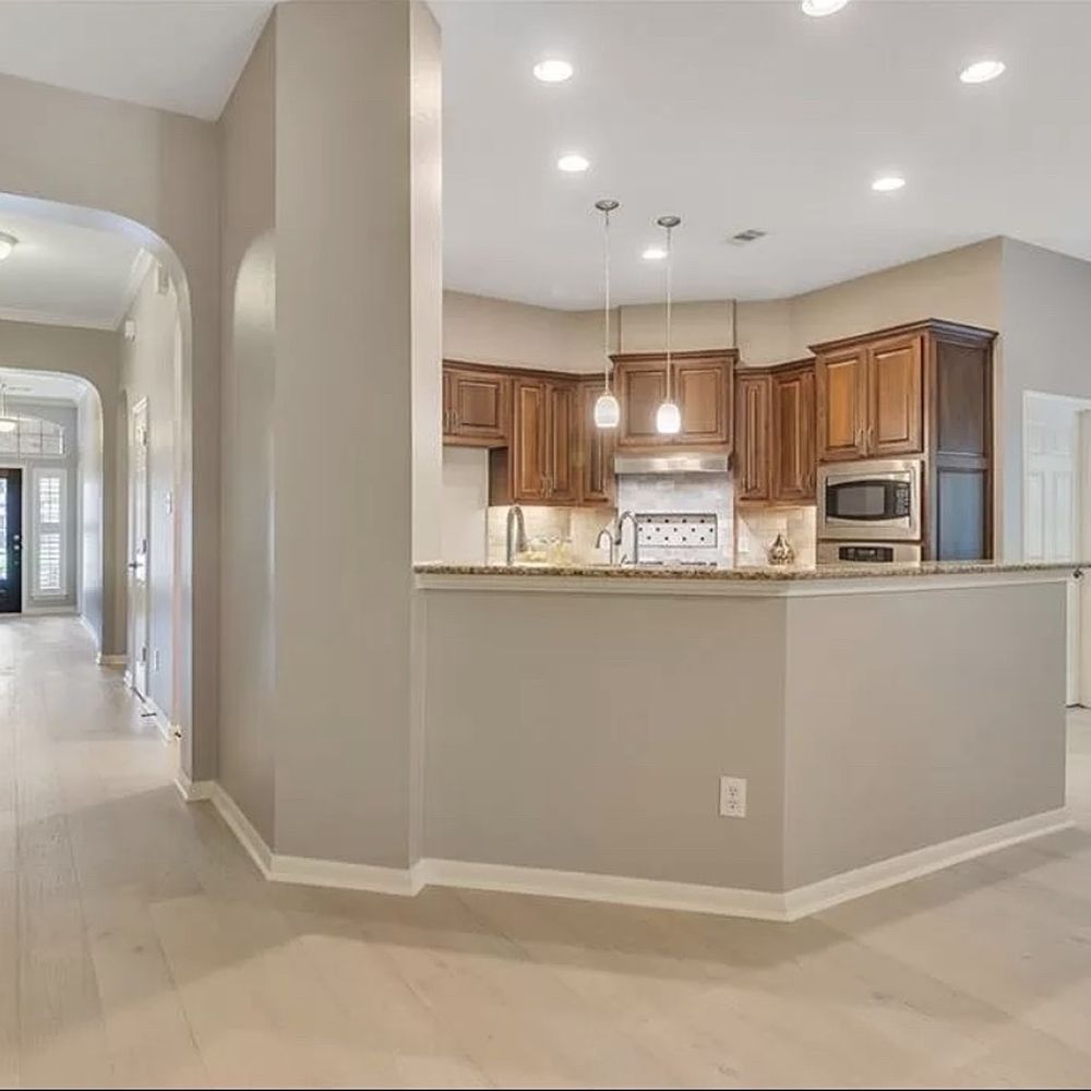 Lone Star Floors - Foyer wood flooring (formerly tile) - Carpeting Near Me - Austin, Texas Lone Star Floors - Foyer wood flooring (formerly tile) - Carpeting Near Me - Austin, Texas