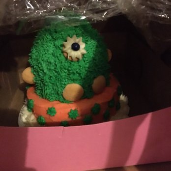 The Cupcake Couture - Supposed to be a monster- 90% of this cake is wrong in comparison to the picture presented. HORRIBLE QUALITY - Cupcakes Near Me - De Pere, Wisconsin