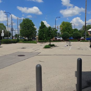 Walgreens - reflects the changing of the area. why bother throwing out your garbage just leave it on the ground with the cart in the middle - Drugstores Near Me - Plainfield, Illinois