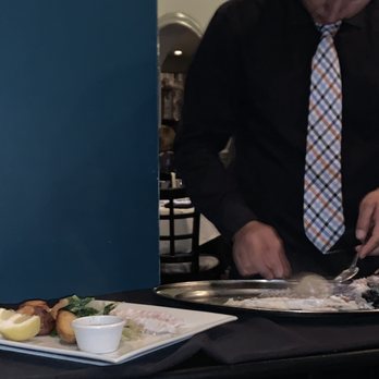 Grasso's - Deboning the fish - Seafood Near Me - Cold Spring Harbor, New York