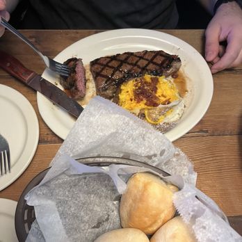 Texas Roadhouse - New York Strip* 12 oz medium rare with baked potatoes on the side - Salad Near Me - Henderson, Nevada