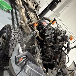 Automotive Innovations - Removing the cab on a diesel truck for repair