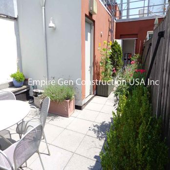 Empire Gen Construction - patio area with table and chairs - General Contractors Near Me - New York, New York Empire Gen Construction - patio area with table and chairs - General Contractors Near Me - New York, New York