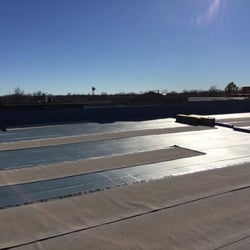 McRoof - base sheet installed with cap sheet, SA Coolstar rolled out to "relax" in sun on cold winter day in Clinton, Ok.