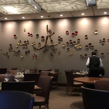 Kiran's - A cool and exotic vibe to the decor in the main dining room. - Indian Near Me - Houston, Texas
