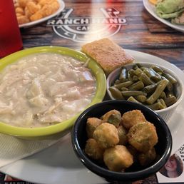 Chicken and dumplings, fried okra, green beans with some cornbread.