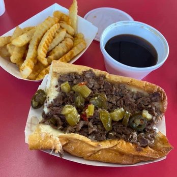 Big Mill's - Chicago style Cheesesteak. Steak sandwich with provolone and giardiniera, served with au jus to dip! - Sandwiches Near Me - Gainesville, Florida Big Mill's - Chicago style Cheesesteak. Steak sandwich with provolone and giardiniera, served with au jus to dip! - Sandwiches Near Me - Gainesville, Florida