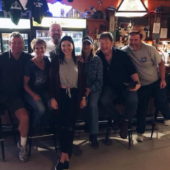 D's Dear Stand - a group of people sitting at a bar - Steakhouses Near Me - Sheldon, North Dakota