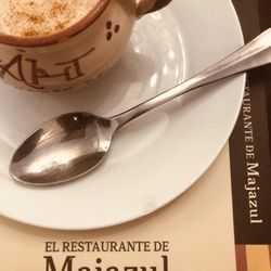 Dehesa de Majazul - My dessert- arroz con leche and a helping of black hair (I have red)