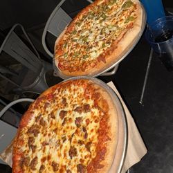 The Pie Pizzeria - South Salt Lake - 2 medium pizzas: 1 with Jalepeños, feta cheese, and chicken. Other with sausage and pepperoni