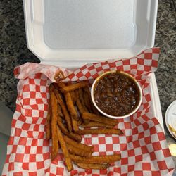 On Q Smokehouse Grill - 3 meat combo of ribs, brisket, and pulled pork sandwich with sweet potato fries & baked beans $22 (instagram: @issa.cheatday)