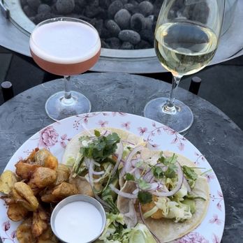 Charmaine’s - Crispy Fish Tacos with fried Potatoes paired with white wine and cocktail. 8/10 - Lounges Near Me - San Francisco, California